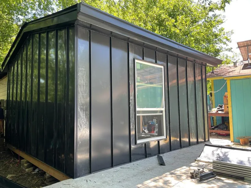 Black standing seam metal wall panels for Roof Inspection in Longboat Key