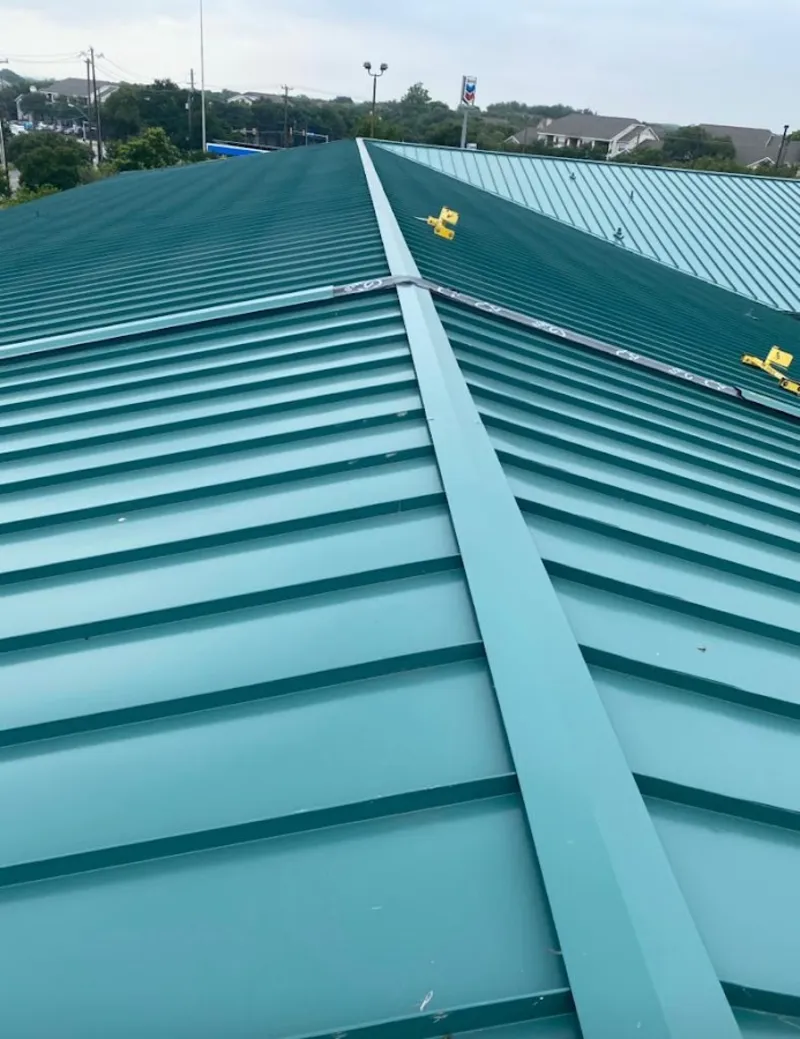 Green commercial metal roof ridge and valley for Metal Roof Repair in Longboat Key